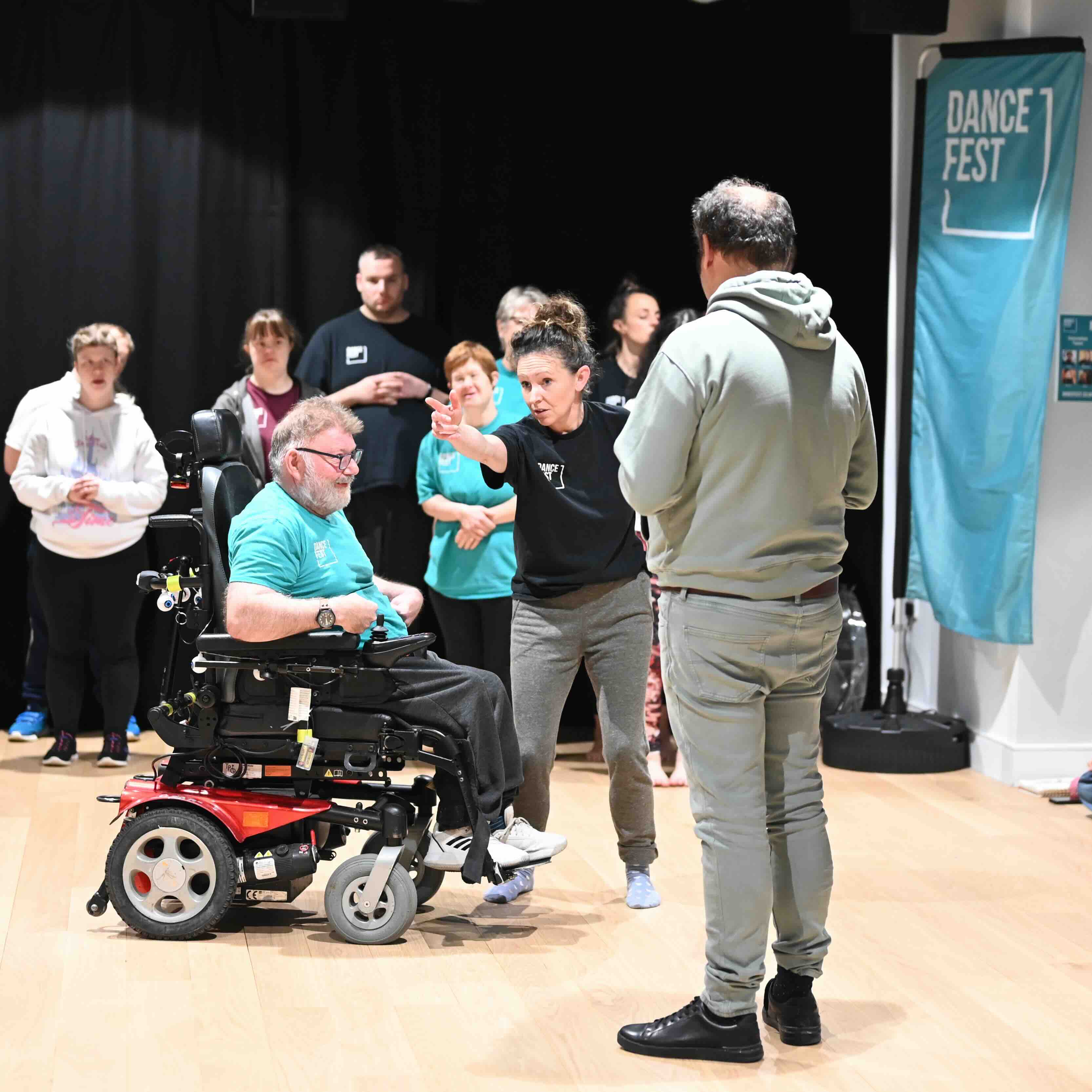 A group of dancers in an inclusive dance class